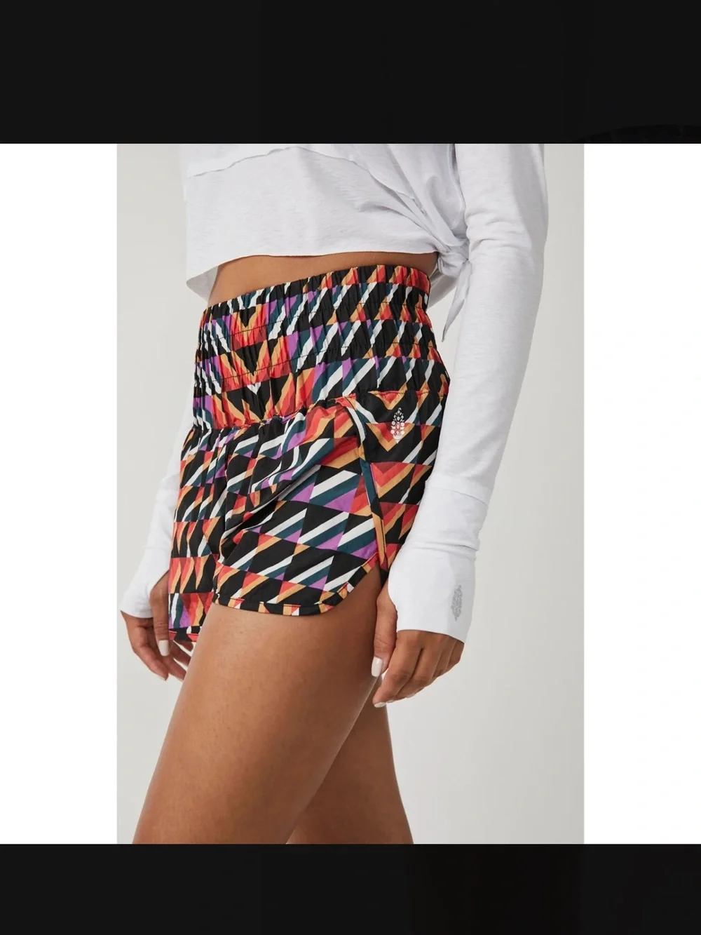 NWT Free people movement Orange crush combo print athletic shorts size Xs